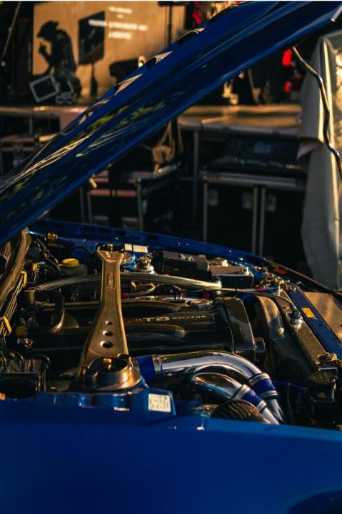 Dyno run data and technician adjusting ECU