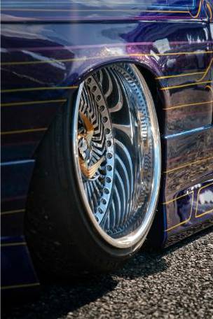 Vehicle underbody with custom exhaust